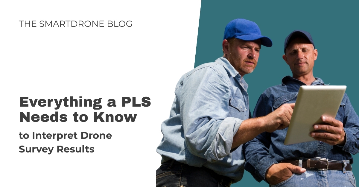 Two professional land surveyors reviewing drone survey results