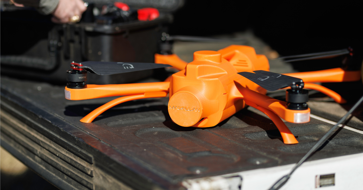 a Magellan LiDAR drone resting on a truck bed
